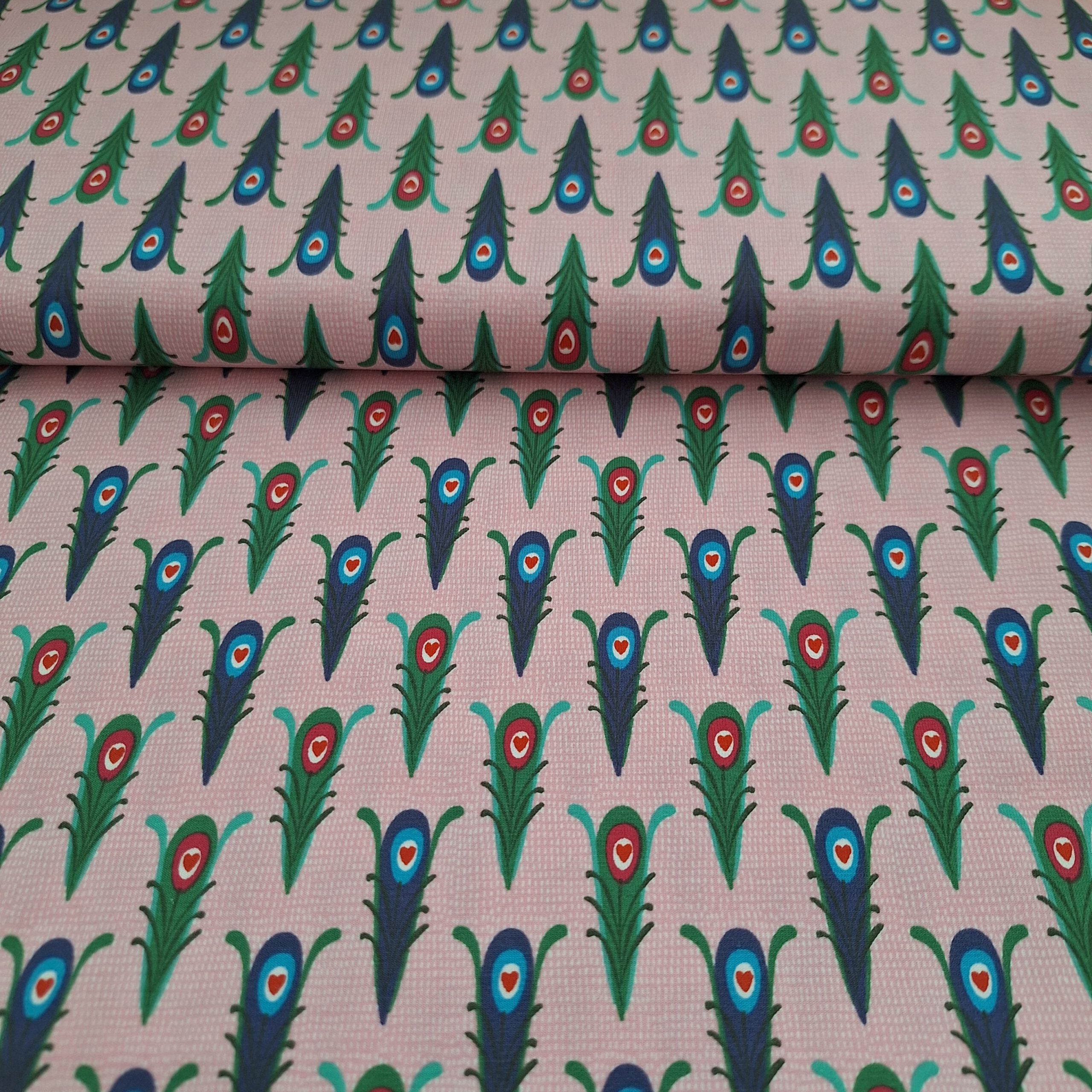 Baumwolljersey rosa mit abstrakten Motiven