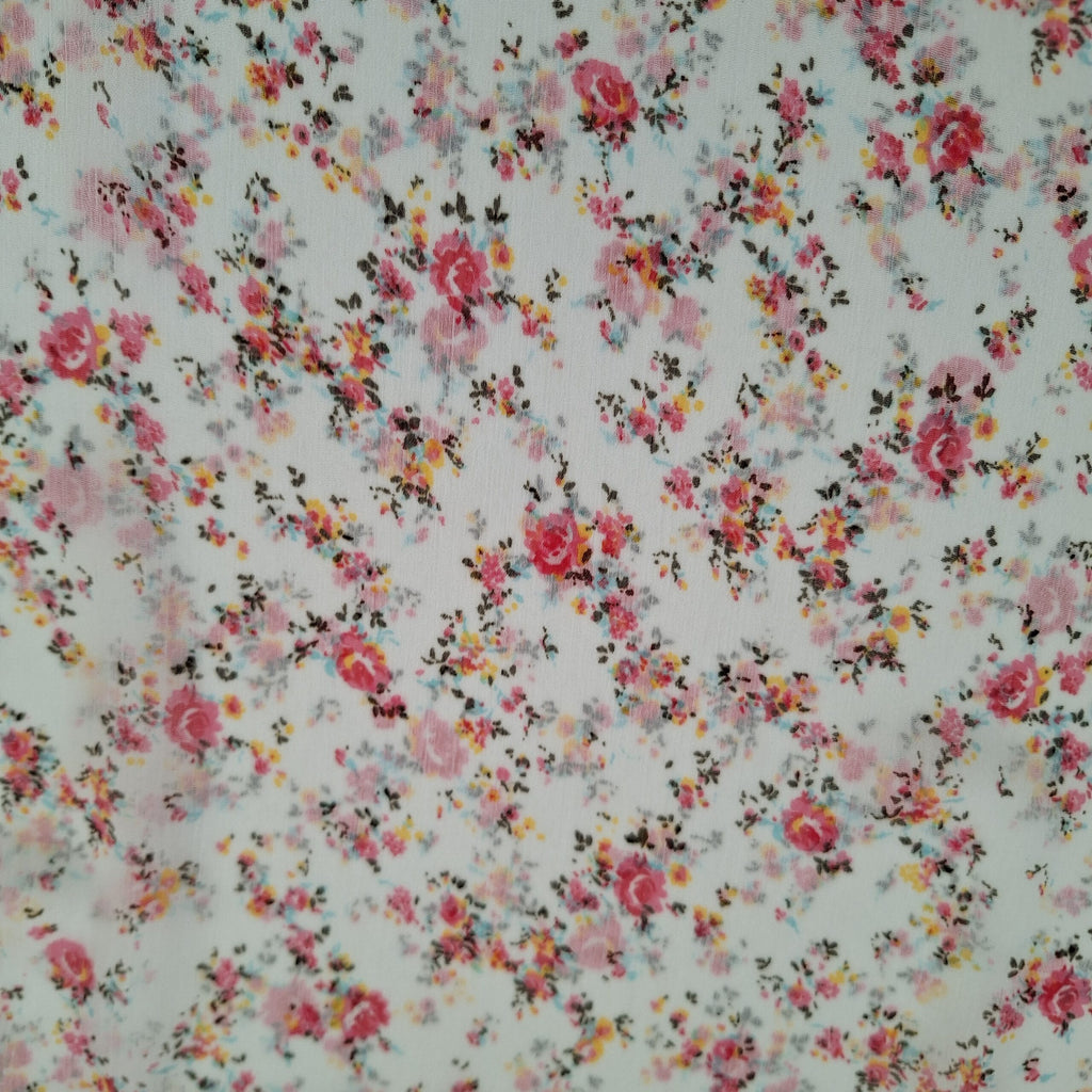 Viskose weiß mit kleinen rosa Blüten (sehr transparent)