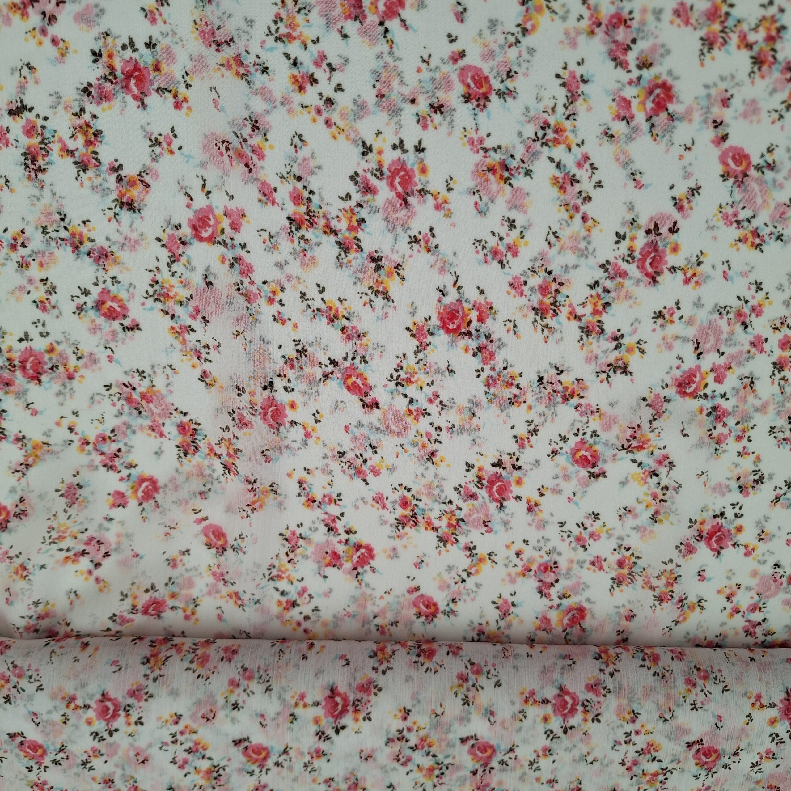 Viskose weiß mit kleinen rosa Blüten (sehr transparent)