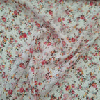 Viskose weiß mit kleinen rosa Blüten (sehr transparent)