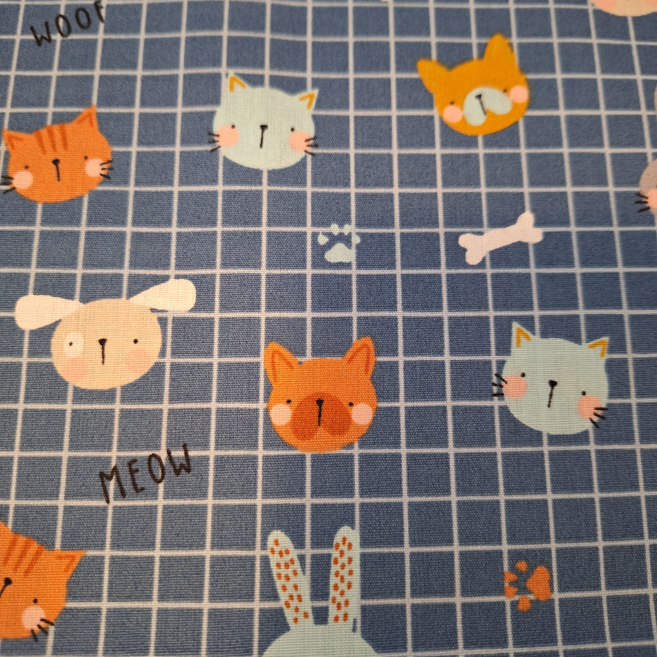 Popeline blau kariert mit Tiermotiven