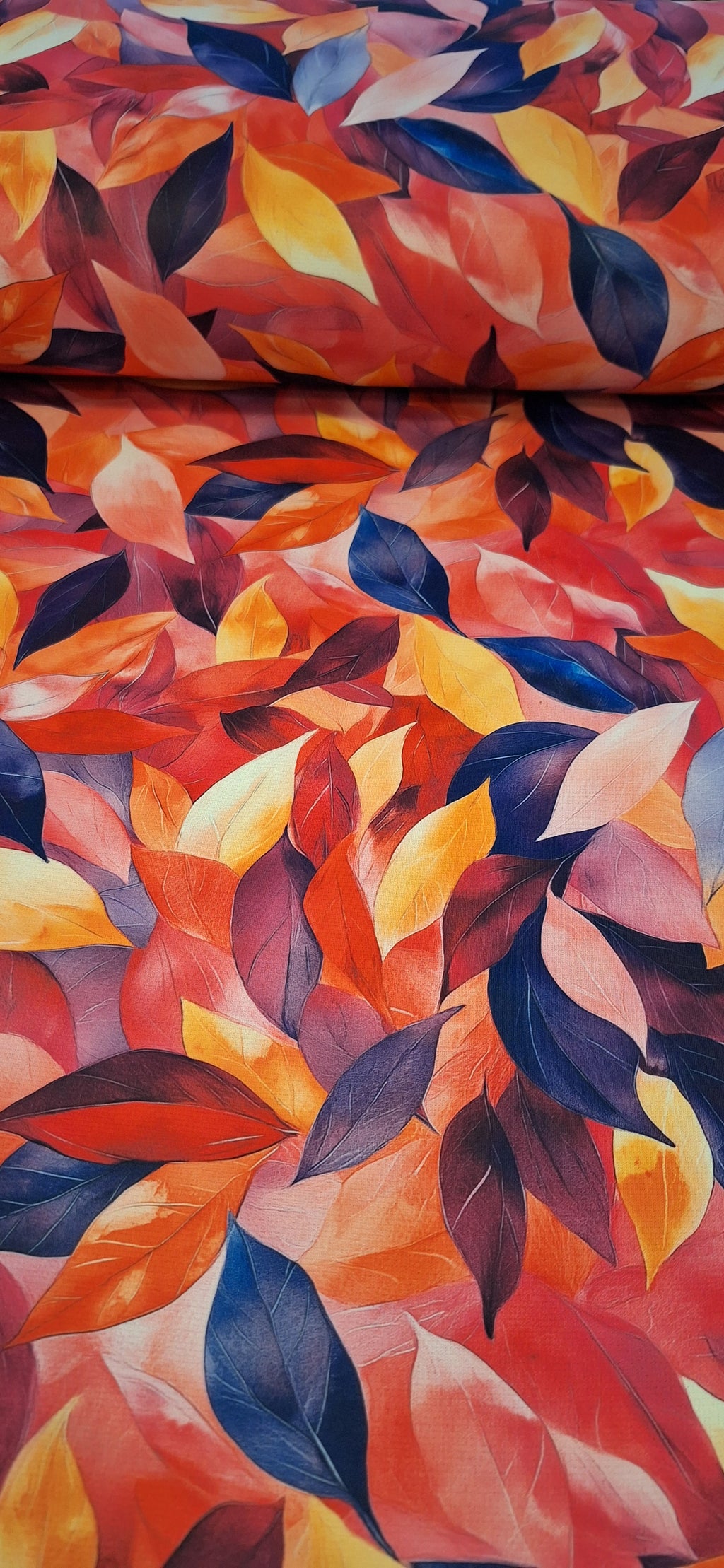 Alpenfleece koralle mit Blättermotiven (Digitaldruck)