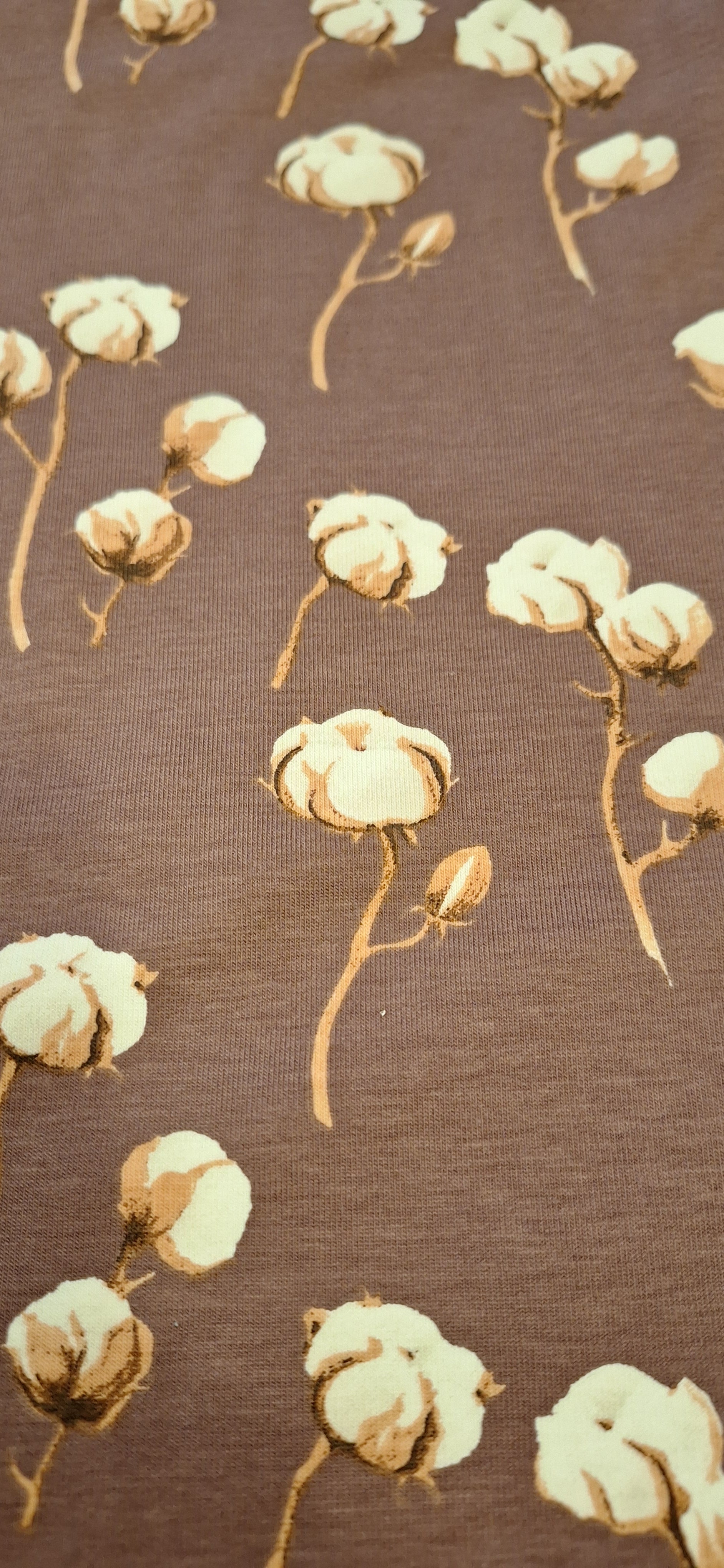 Baumwolljersey mauve mit Baumwollblüten