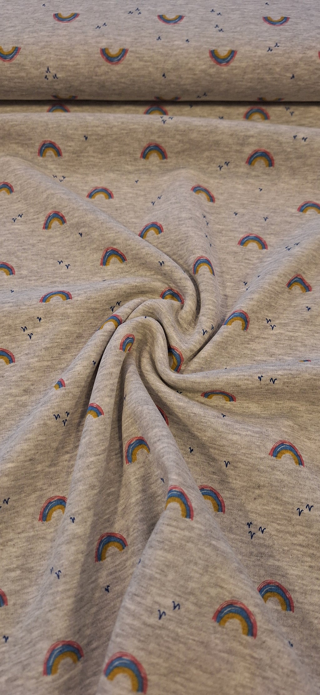 Alpenfleece grau meliert mit Regenbögen
