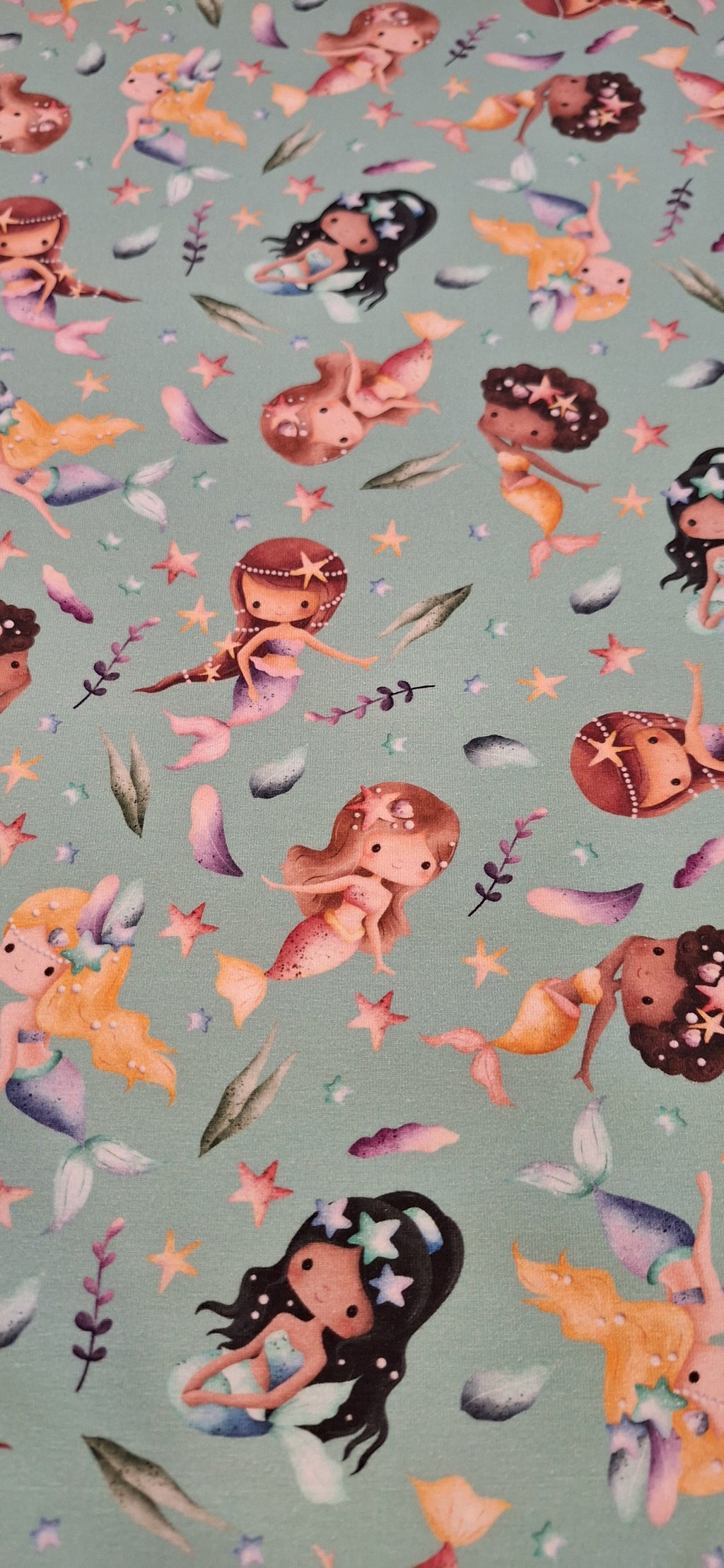 Baumwolljersey türkis mit Meerjungfrauen