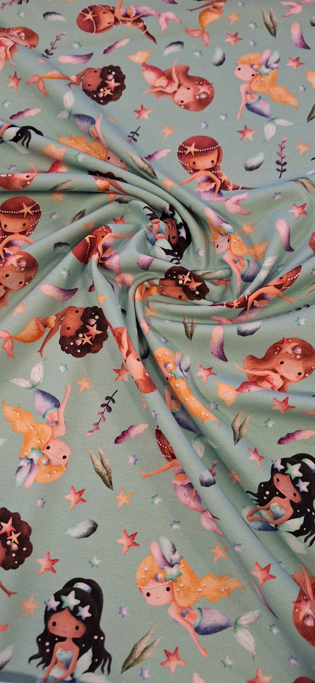 Baumwolljersey türkis mit Meerjungfrauen