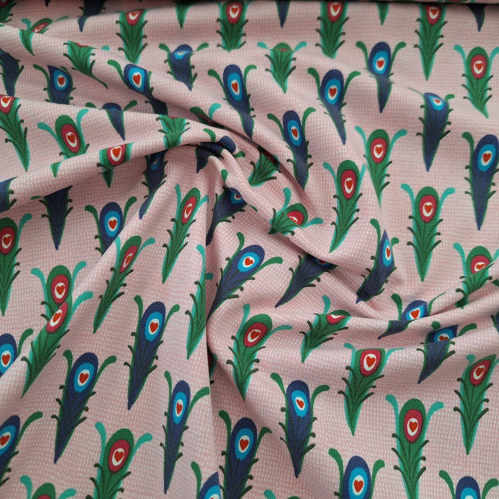 Baumwolljersey rosa mit abstrakten Motiven