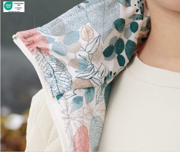 Popeline grün mit Blättermotiven