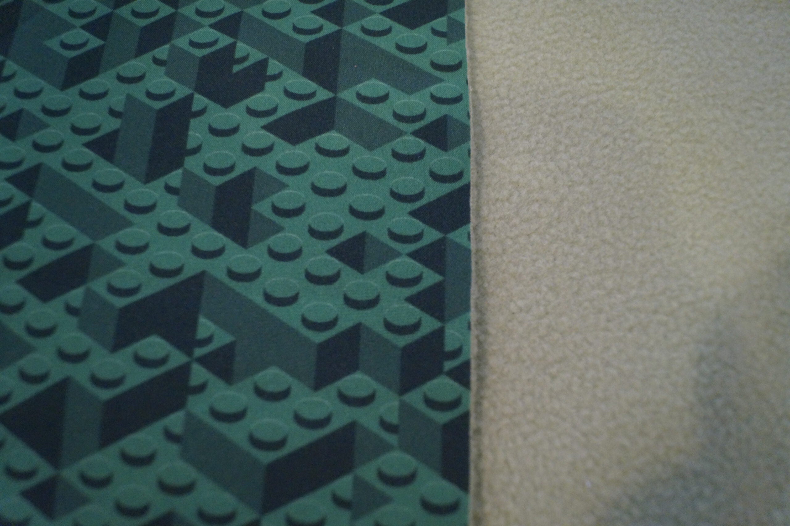 Softshell grün mit Klemmbausteinen (Druck)