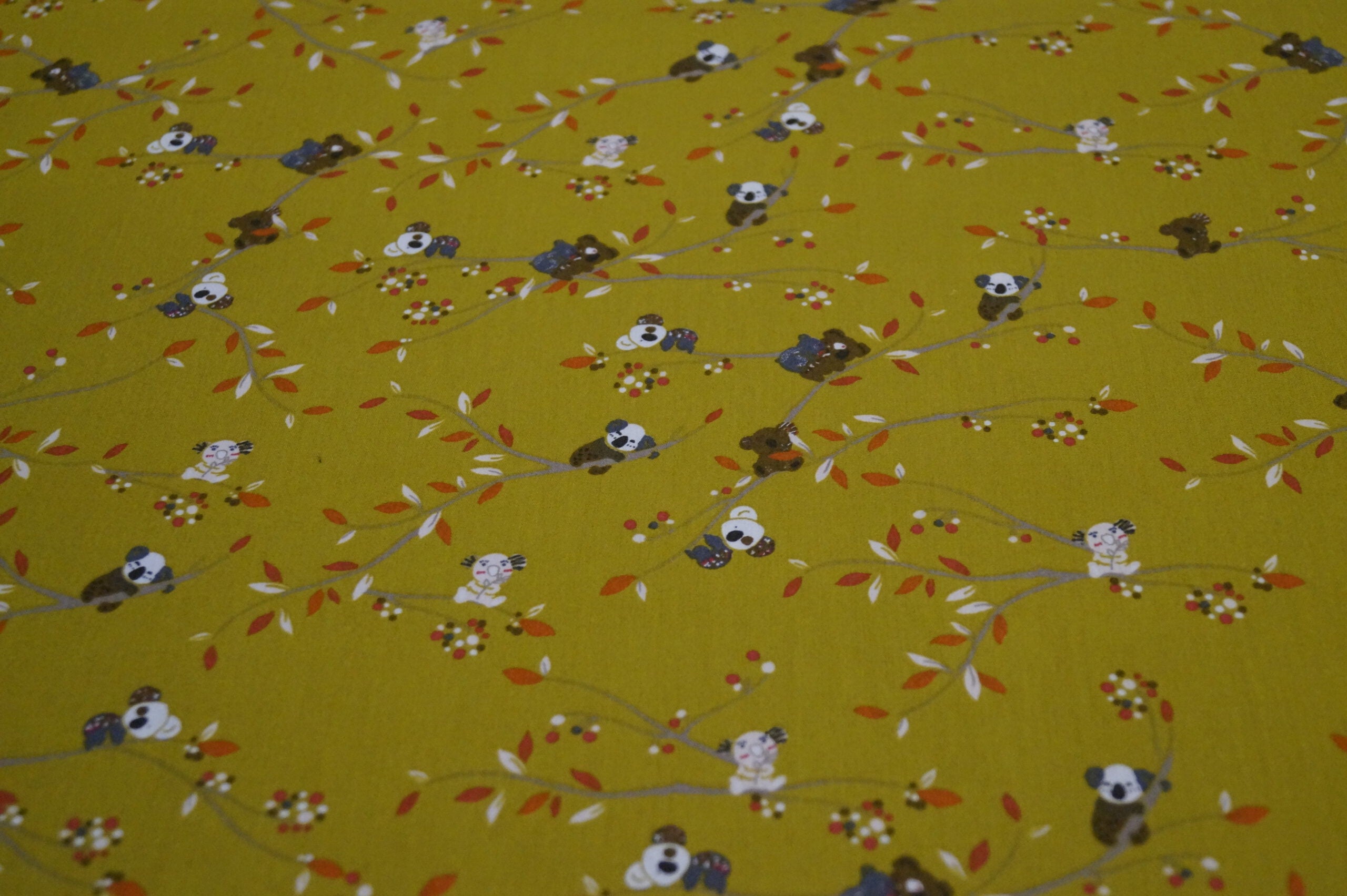 Popeline ocker mit Koalas