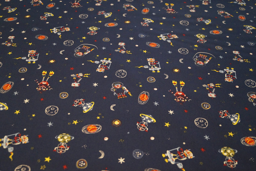 Popeline dunkelblau mit Weltallmotiven