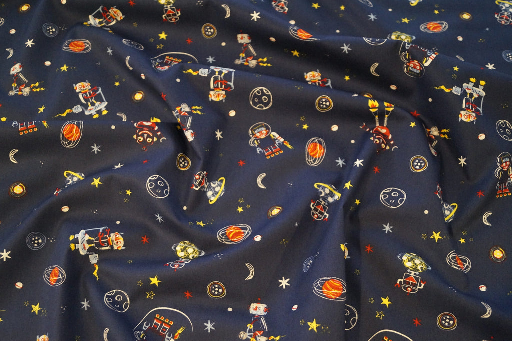 Popeline dunkelblau mit Weltallmotiven