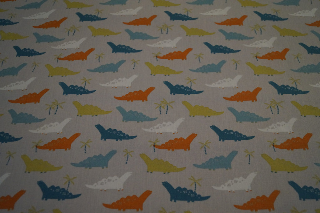 Popeline grau mit Dinos