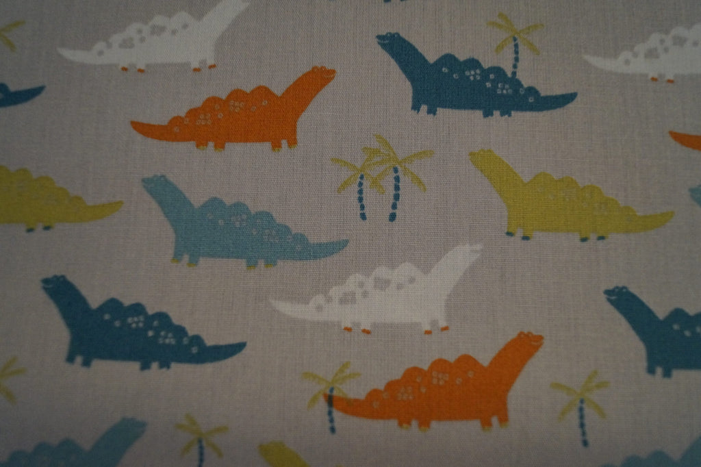 Popeline grau mit Dinos