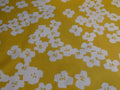 Baumwolle senfgelb mit Blumen (PU beschichtet)