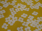 Baumwolle senfgelb mit Blumen (PU beschichtet)