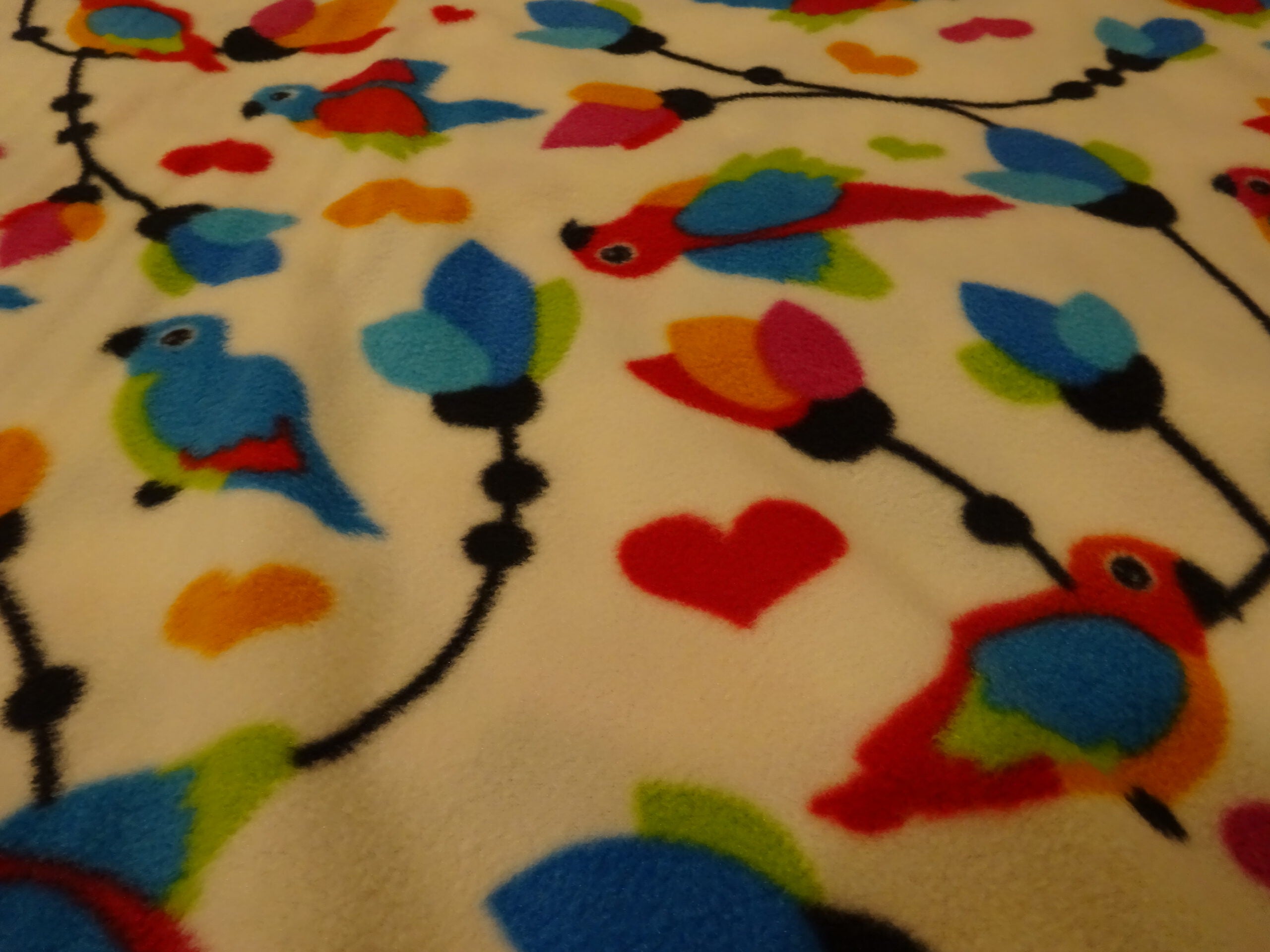 Fleece weiß mit Vögeln