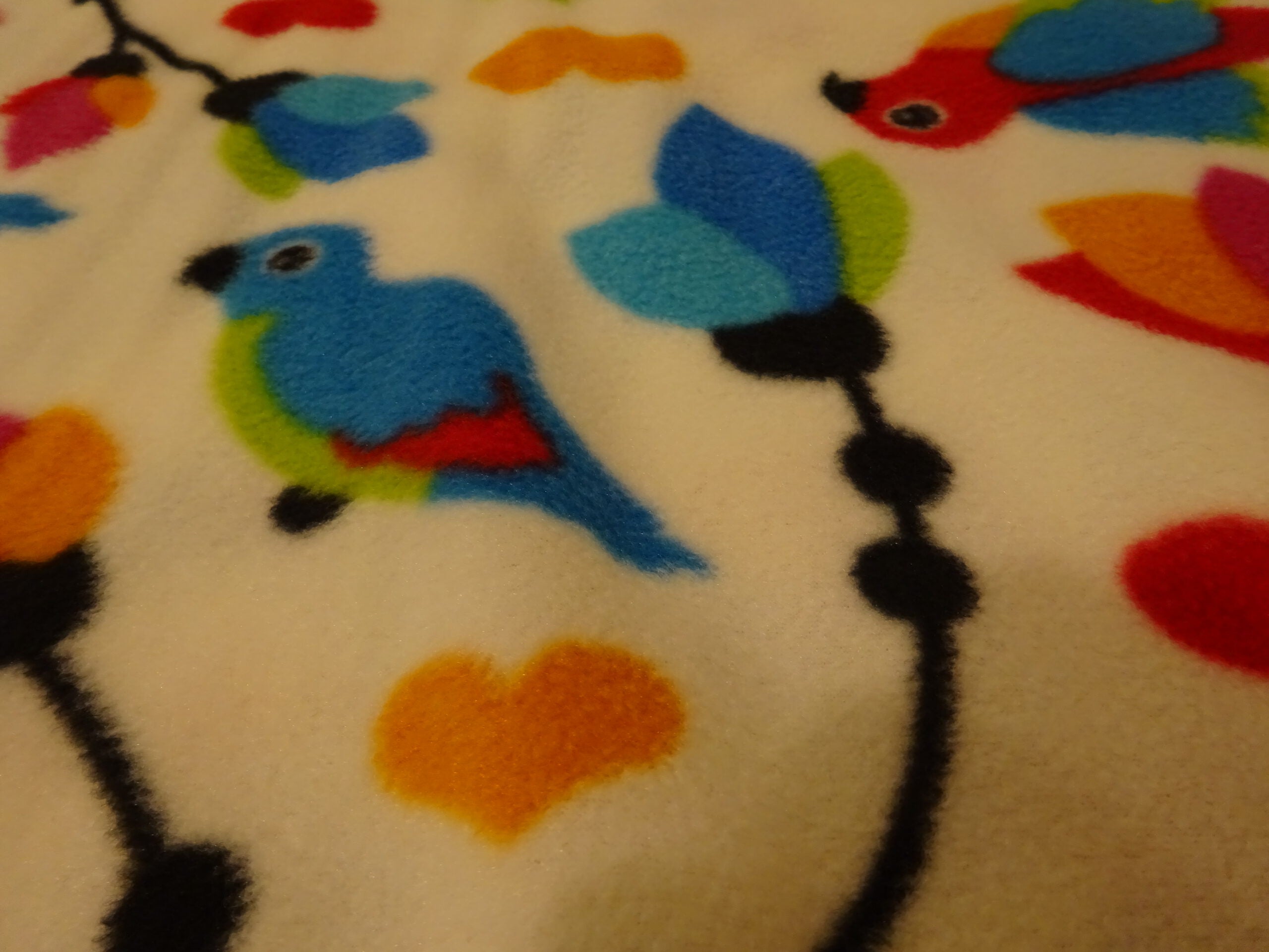 Fleece weiß mit Vögeln