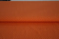 Baumwolljersey orange mit weißen Punkten