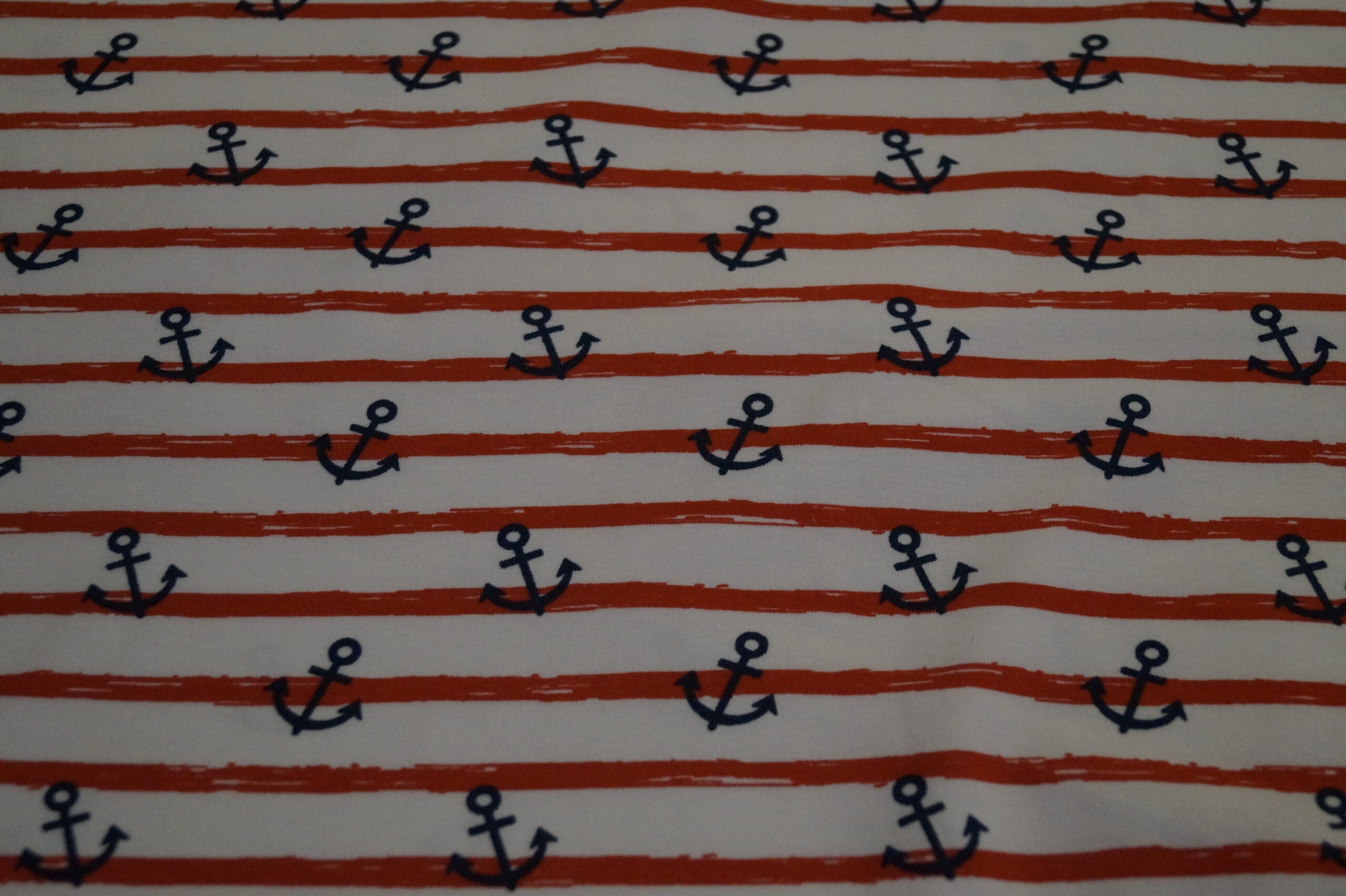 Bio-Baumwolljersey rot/weiß gestreift mit Ankern (GOTS-zertifiziert)