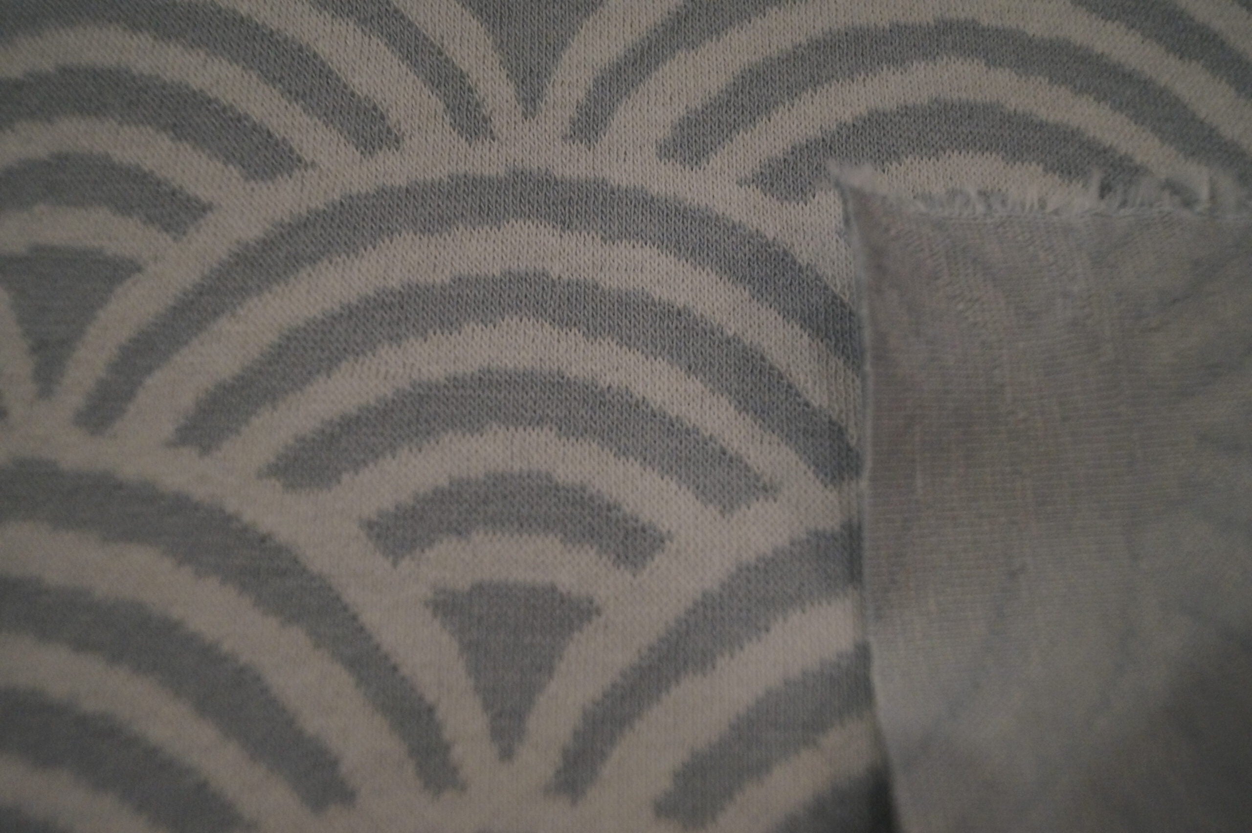 Bio-Jacquard türkis mit Regenbogenformen (GOTS-zertifiziert)