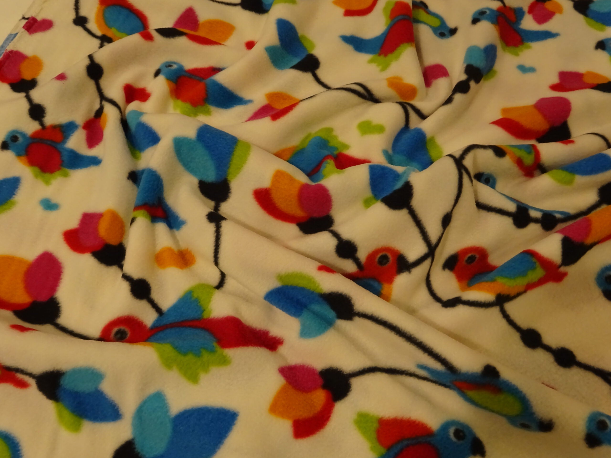 Fleece weiß mit Vögeln