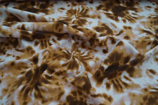 French Terry orange/braun Batikoptik (Druck)