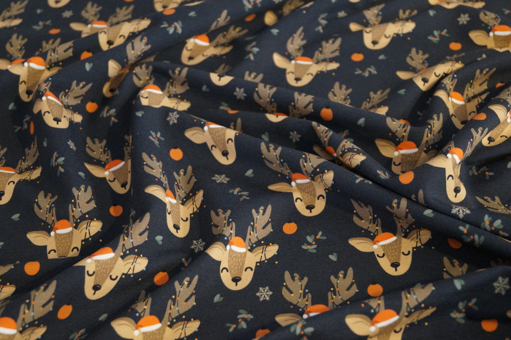 French Terry dunkelblau mit Weihnachtsrentieren