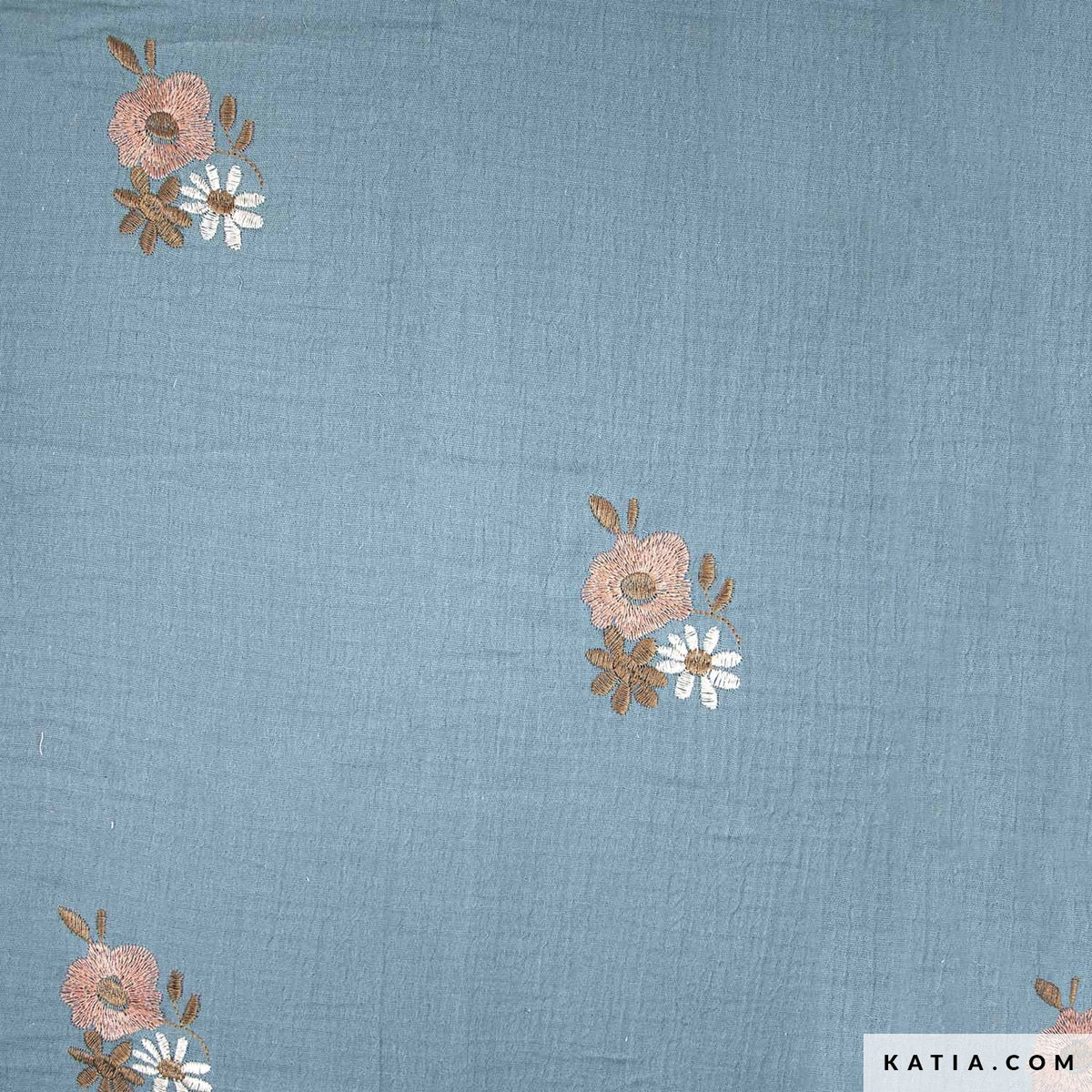 Musselin blau bestickt mit Blumen