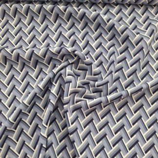 Viskose mit geometrischem Muster in Blautönen