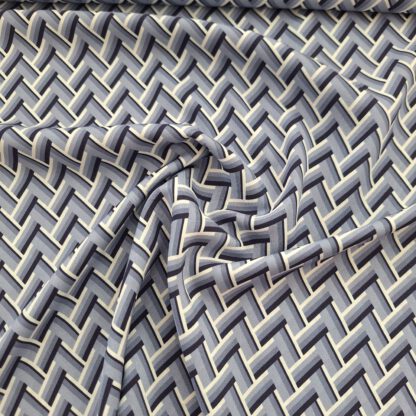 Viskose mit geometrischem Muster in Blautönen